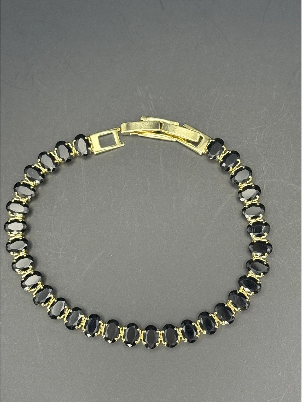 candy+clover black oval crystal gold tone tennis bracelet